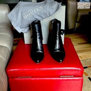 Alexander McQueen black booties.